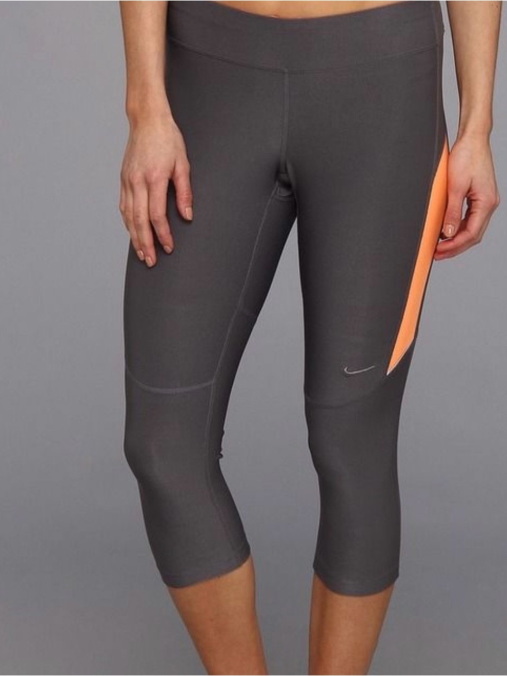 Nike Women’s Gray Capri Leggings with Orange Accent